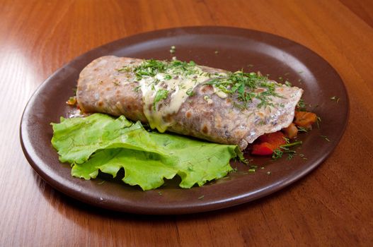 rolled pancakes stuffed with vegetables. 