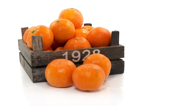 old wooden box with tangarine fruit