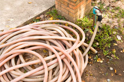 Rubber tube were wearing on the water faucet.