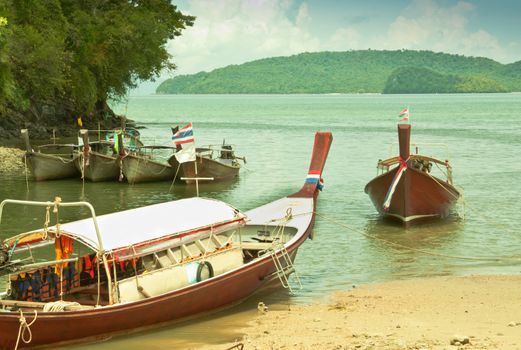 Local fishing boats. Moored in the harbor where the water is not deep.