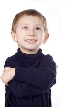 Happy and cheerful boy looking up