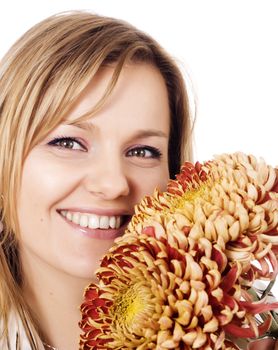 Beautiful young woman with chrysanthemums..