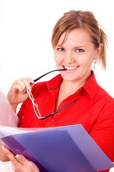 Portrait of a beautiful young business woman holding a folder, considering options