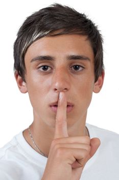 young swarthy man showing silence gesture, hand over mouth - isolated on white background
