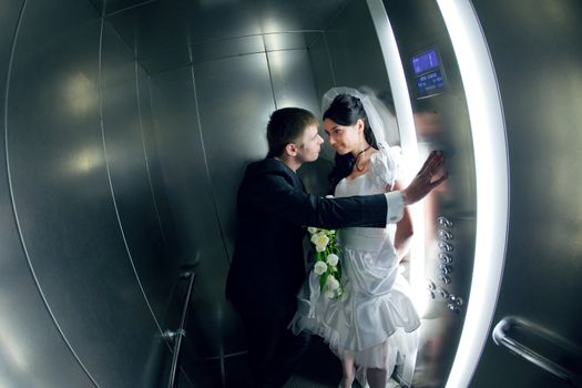 happy couple in the lift