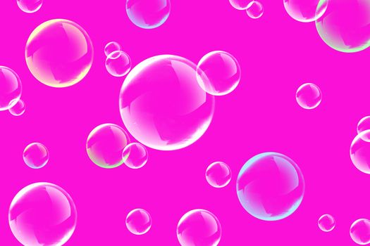 The soap bubbles fly on a pink background