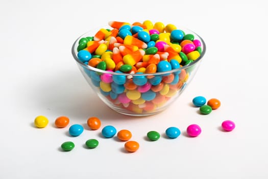 Colored candy inside glass bowl