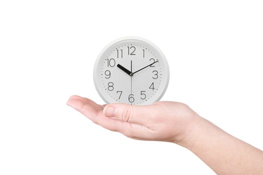 The clock on a palm on a white background
