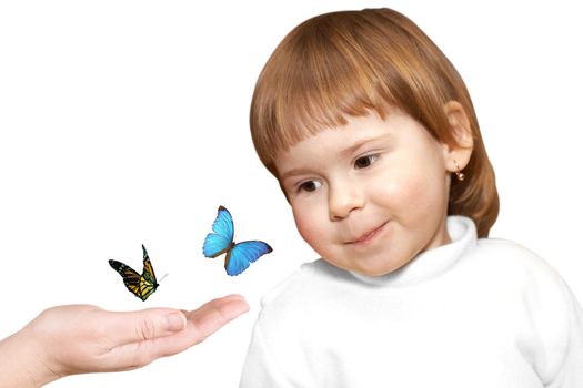 The small girl and multicoloured butterflies on a palm