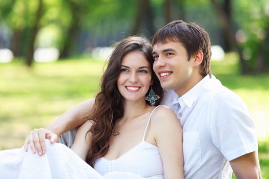 Portrait of a young romantic couple embracing each other