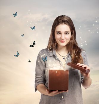 Girl Opening a Magical Giftbox with Butterflies
