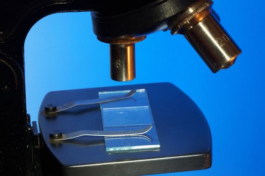 Microscope for the analysis on a blue background