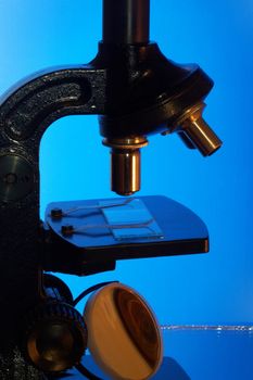 Microscope for the analysis on a blue background