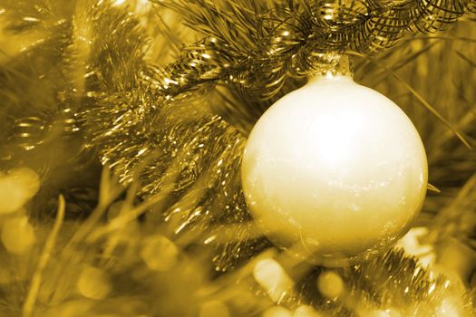 Xmas tree. White glass sphere.  Sparkling tree ornament 