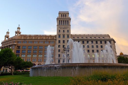 Bank and fountain Catalonia Plaza in Barcelona, Spain