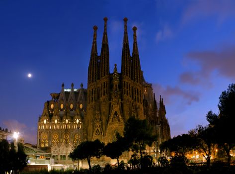 SPAIN - AUGUST 24: La Sagrada Familia in night - cathedral designed by Antoni Gaudi, which is being build since 1882 and is not finished yet August 24, 2012, in Barcelona, Spain.