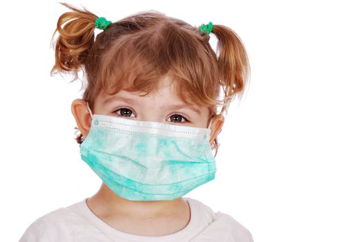 Little girl doctor in mask studio shot