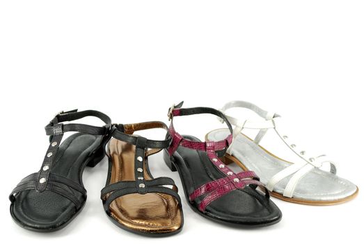 Woman new leather sandals on white