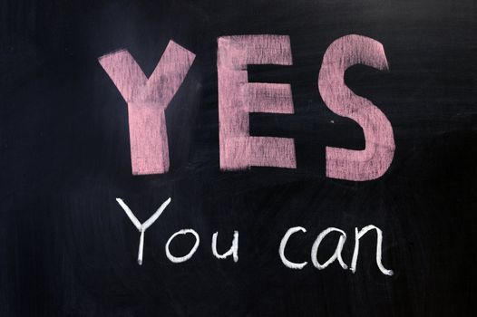 Chalk drawing - "YES you can" written on chalkboard