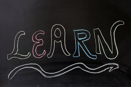 Chalk drawing - 'LEARN' word written on chalkboard