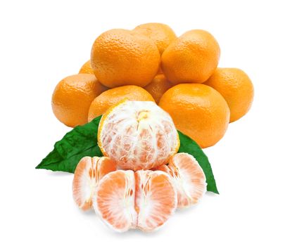 Whole and peeled tangerines on a white background