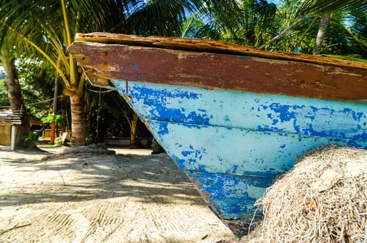 Closeup shot of a blue beached canoe in San Andres y Providencia, Colombia