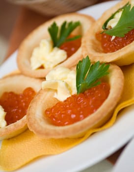    Tartlet with red caviar   . Shallow depth-of-field