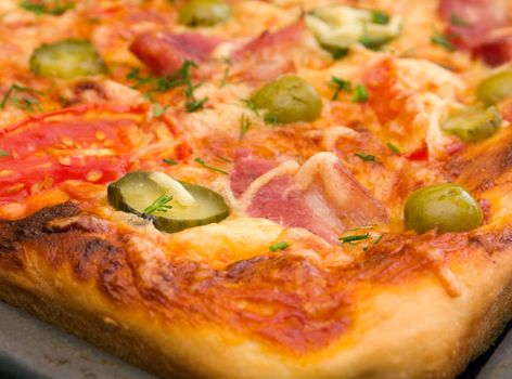 pizza ham and vegetable Shallow depth-of-field. 