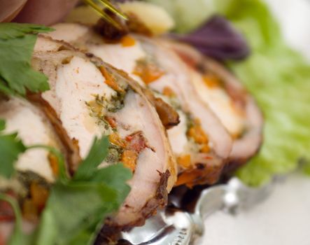 Beautiful sliced food arrangement with some vegetables. Shallow depth-of-field