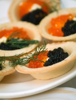    Tartlet with red caviar   . Shallow depth-of-field