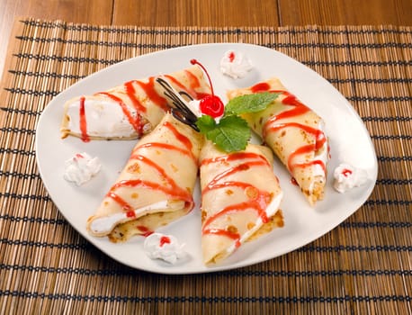 Dessert - Pancakes with cerise Sauce .close-up