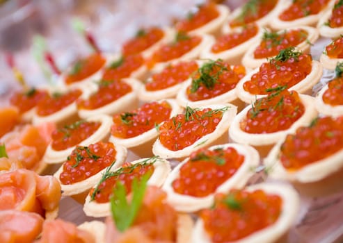    Tartlet with red caviar   . Shallow depth-of-field