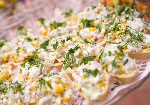  Delicious tartlet with corn and fish .Shallow depth-of-field. 