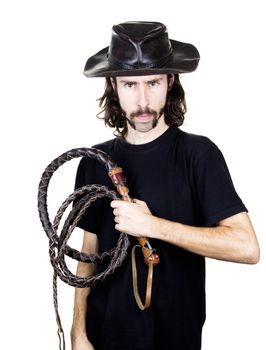 a men with whip and hat 
