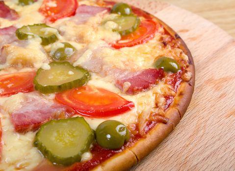 pizza ham and vegetable Shallow depth-of-field. 