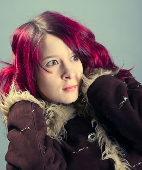 fashion portrait of a red hair woman, studio shot 