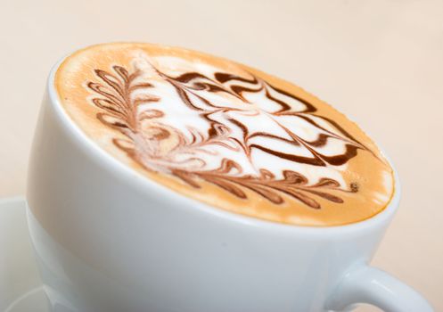 cappuccino cup.coffee . Shallow depth-of-field. with washed away by back background