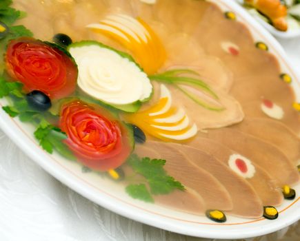 Aspic from meat with egg,tomatoes. Shallow depth-of-field. 