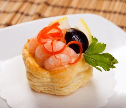   Canapes with   prawns  and lemon.closeup. Shallow depth-of-field. 