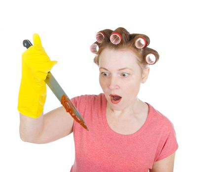 Aggressive housewife  with bloodstained  knife. white background