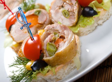 Canape with meat loaf. Shallow depth-of-field. 
