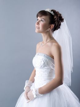 Beauty young bride dressed in elegance white wedding dress 