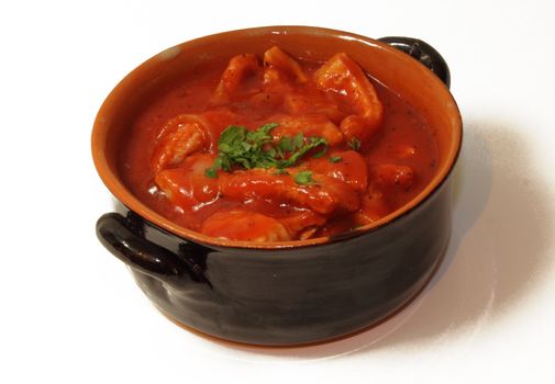 tripe cooked with tomato sauce