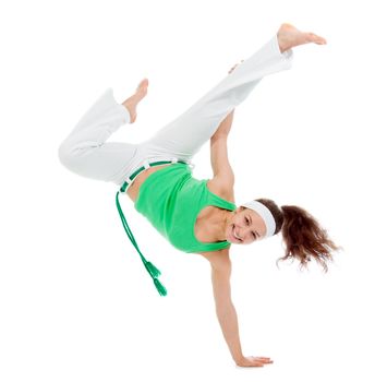 girl  capoeira dancer posing  over white background 