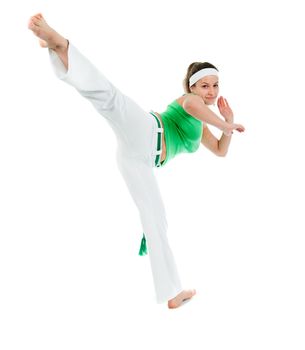 girl  capoeira dancer posing  over white background 