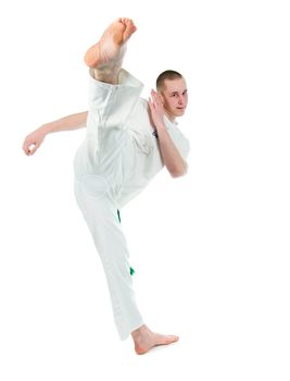   capoeira dancer posing  over white background 