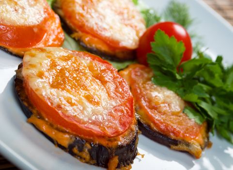 roasted tomato and eggplant. Shallow depth-of-field. 