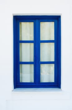 Blue Window on white House in Greece