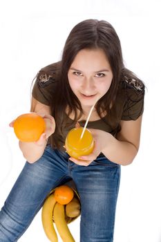 Girl with orange juice and fruit isolated