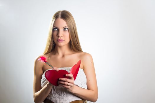 Valentines Day. Woman holding Valentines Day heart sign
